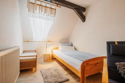 Ein Bett oder Betten in einem Zimmer der Unterkunft Ferienhaus St. Andreasberg