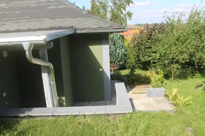 Ein Garten an der Unterkunft Ferienhaus Kleine Hexe