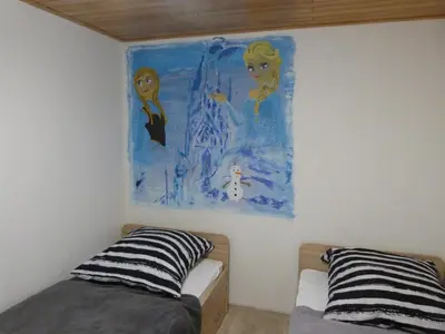 Ein Bett oder Betten in einem Zimmer der Unterkunft Welcoming Family Escape