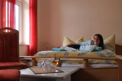 Ein Bett oder Betten in einem Zimmer der Unterkunft Hasseröder Hof