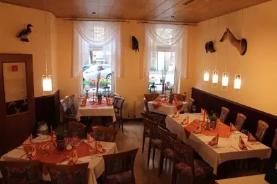 Ein Restaurant oder anderes Speiselokal in der Unterkunft Hasseröder Hof