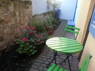 Ein Garten an der Unterkunft Fachwerkhotel garni - Ferienhäuser Vorhof zur Hölle