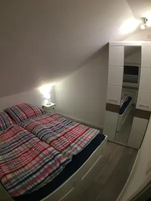 Ein Bett oder Betten in einem Zimmer der Unterkunft Ferienwohnung MILA Braunlage