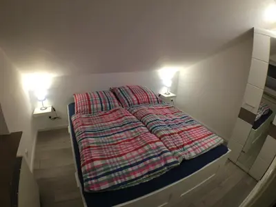 Ein Bett oder Betten in einem Zimmer der Unterkunft Ferienwohnung MILA Braunlage