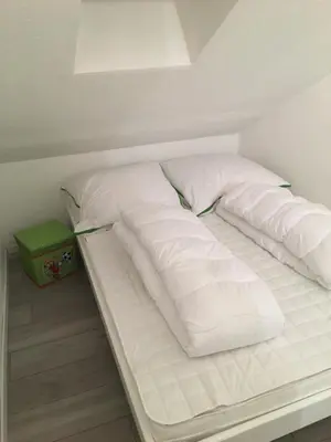 Ein Bett oder Betten in einem Zimmer der Unterkunft Ferienwohnung MILA Braunlage