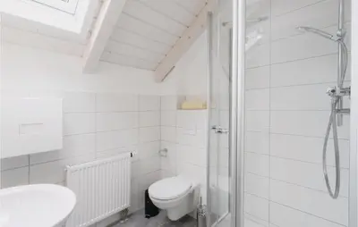 Ein Badezimmer in der Unterkunft Ferienhausdorf Thale