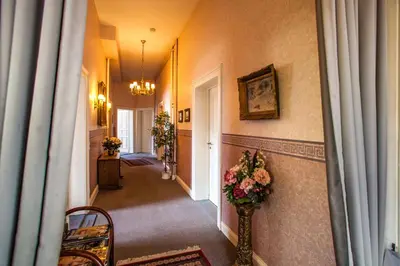 Ein Bett oder Betten in einem Zimmer der Unterkunft Hotel Rosenau
