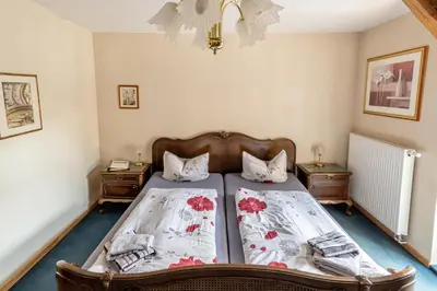 Ein Bett oder Betten in einem Zimmer der Unterkunft Altstadt-Pension Koch