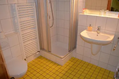 Ein Badezimmer in der Unterkunft Altstadt-Pension Koch