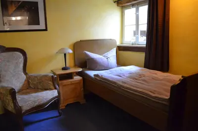 Ein Bett oder Betten in einem Zimmer der Unterkunft Altstadt-Pension Koch