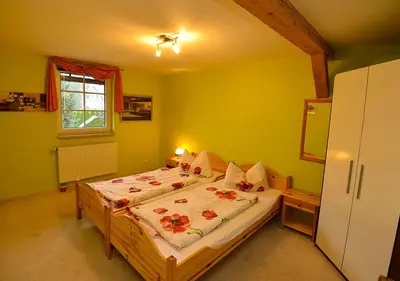 Ein Bett oder Betten in einem Zimmer der Unterkunft Ferienhaus Brockenbäcker