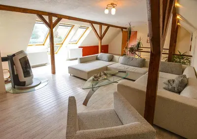 Ein Sitzbereich in der Unterkunft Ferienhaus Brockenbäcker