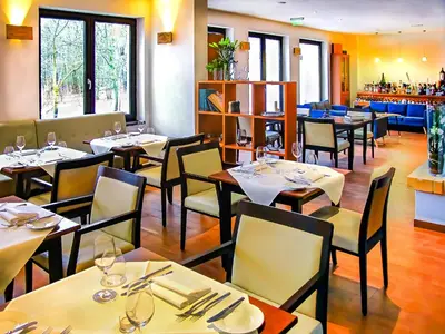 Ein Sitzbereich in der Unterkunft DAS TANN rooms & wine