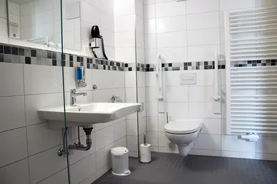Ein Badezimmer in der Unterkunft Hotel garni Tilia