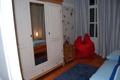 Ein Bett oder Betten in einem Zimmer der Unterkunft Ferienwohnungen an der Kaiserpfalz