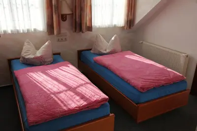 Ein Bett oder Betten in einem Zimmer der Unterkunft Wehrstedter Hof
