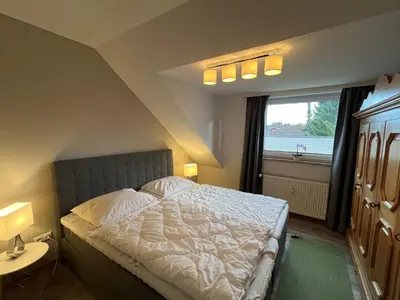 Ein Bett oder Betten in einem Zimmer der Unterkunft Wohlfühlort in der Ferienresidenz Wurmbergblick