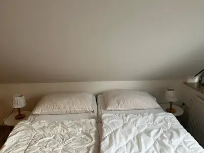Ein Bett oder Betten in einem Zimmer der Unterkunft Wohlfühlort in der Ferienresidenz Wurmbergblick