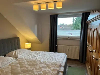 Ein Bett oder Betten in einem Zimmer der Unterkunft Wohlfühlort in der Ferienresidenz Wurmbergblick