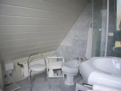 Ein Badezimmer in der Unterkunft Paul Lincke Residenz