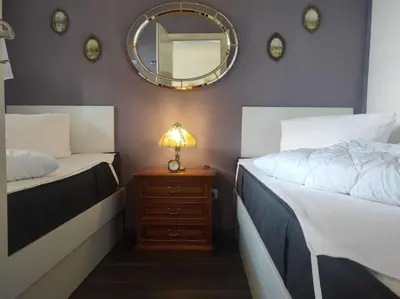 Ein Bett oder Betten in einem Zimmer der Unterkunft Ferienwohnung Schüler-Wolke 2