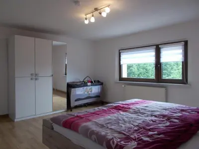 Ein Bett oder Betten in einem Zimmer der Unterkunft Janos Ferienwohnung 2
