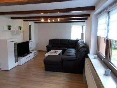 Ein Sitzbereich in der Unterkunft Janos Ferienwohnung