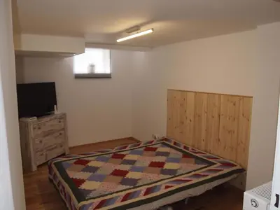 Ein Bett oder Betten in einem Zimmer der Unterkunft Ferienwohnung Harz und Herzlich