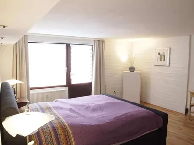 Ein Bett oder Betten in einem Zimmer der Unterkunft Ferienwohnung Harz und Herzlich