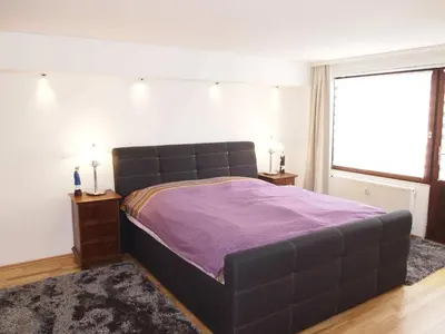 Ein Bett oder Betten in einem Zimmer der Unterkunft Ferienwohnung Harz und Herzlich