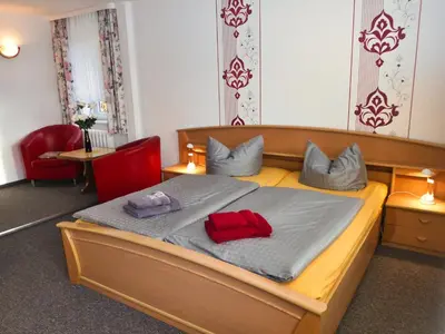Ein Bett oder Betten in einem Zimmer der Unterkunft Pension Haus Rodenstein
