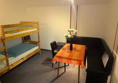 Ein Bett oder Betten in einem Zimmer der Unterkunft Pension Haus Rodenstein