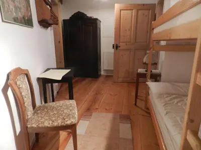 Ein Bett oder Betten in einem Zimmer der Unterkunft Ferienwohnung Kutscherhaus