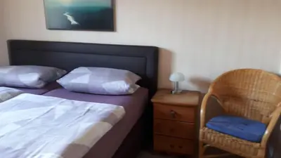 Ein Bett oder Betten in einem Zimmer der Unterkunft Wernigerode Ferienwohnung Schultz