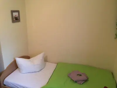Ein Bett oder Betten in einem Zimmer der Unterkunft Ferienhaus Waldglück