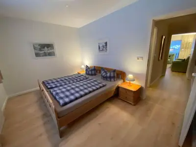 Ein Bett oder Betten in einem Zimmer der Unterkunft Ferienresidenz an der Bode, Wohnung 1