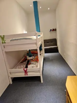 Ein Bett oder Betten in einem Zimmer der Unterkunft Zur Alten Oberförsterei
