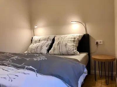 Ein Bett oder Betten in einem Zimmer der Unterkunft Ferienwohnung Gipfelnest