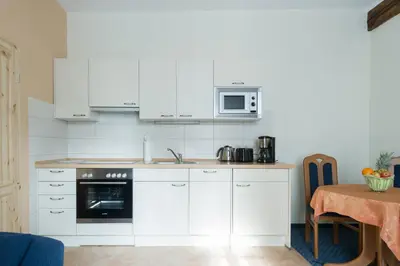Küche/Küchenzeile in der Unterkunft Ferienwohnungen am Klint