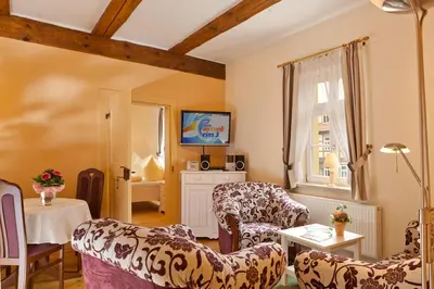 Ein Bett oder Betten in einem Zimmer der Unterkunft Ferienwohnungen am Klint