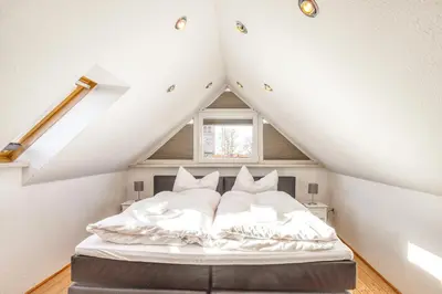 Ein Bett oder Betten in einem Zimmer der Unterkunft Ferienwohnung Ziesing Friedrichsbrunn