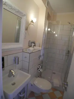 Ein Badezimmer in der Unterkunft Stadtparkhotel Alexandra