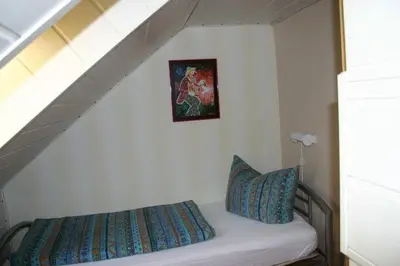 Ein Bett oder Betten in einem Zimmer der Unterkunft Haus Kummeleck, Wohnung 2