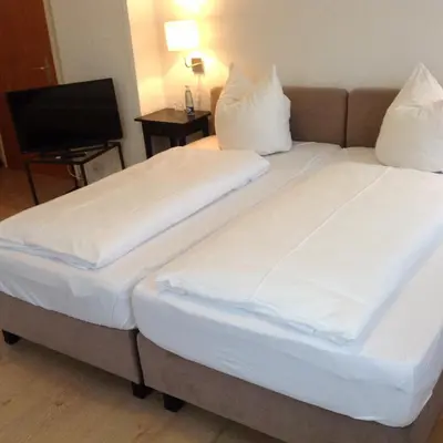 Ein Bett oder Betten in einem Zimmer der Unterkunft Haus am Karpfenteich