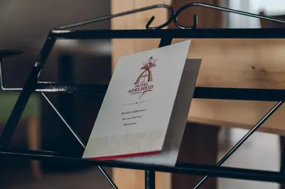 Ein Zertifikat, Auszeichnung, Logo oder anderes Dokument, das in der Unterkunft Adelheid Hotel garni ausgestellt ist