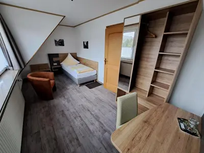 Ein Bett oder Betten in einem Zimmer der Unterkunft Hotel Ingeburg