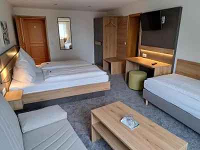 Ein Bett oder Betten in einem Zimmer der Unterkunft Hotel Ingeburg