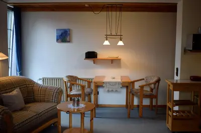 Ein Sitzbereich in der Unterkunft Apartmenthaus - Haus am Schultal,