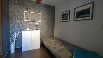 Ein Bett oder Betten in einem Zimmer der Unterkunft FEWO am Wetzstein