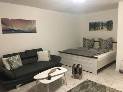 Ein Sitzbereich in der Unterkunft Ferienwohnung Univers